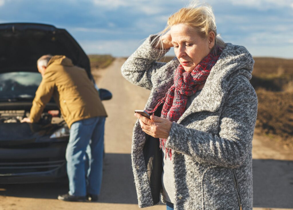 couple calling for roadside assistance