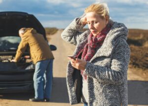 couple calling for roadside assistance